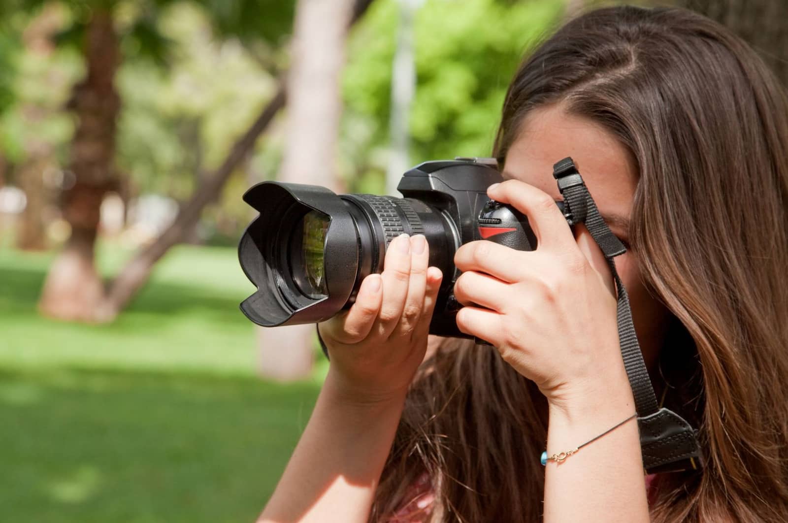 A woman shooting with her camera